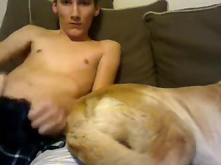 Boy And Dog On Teh Couch